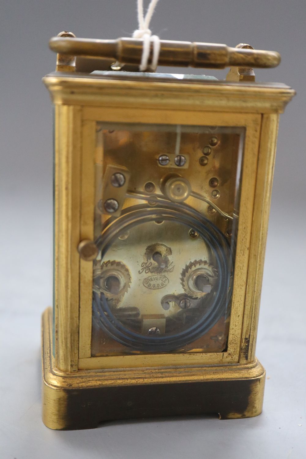 An early 20th century lacquered brass carriage timepiece, height 12cm